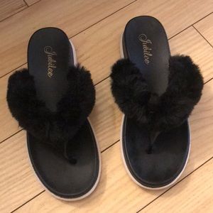 Worn fur flip flops for both indoors and outdoors